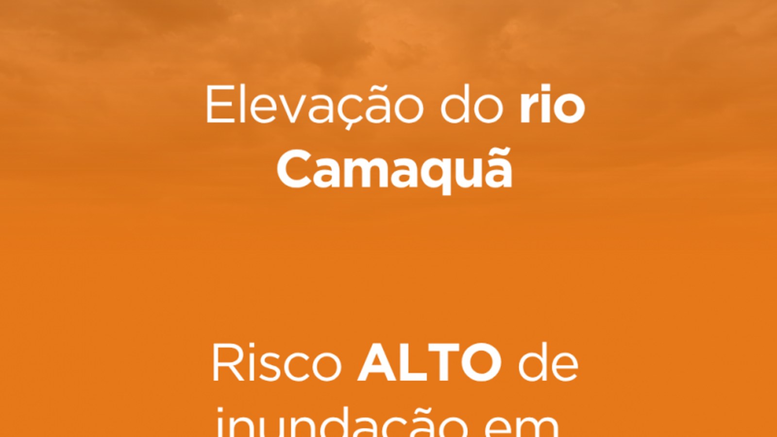 Margem do rio Camaquã com nível elevado próximo à área urbana de Cristal